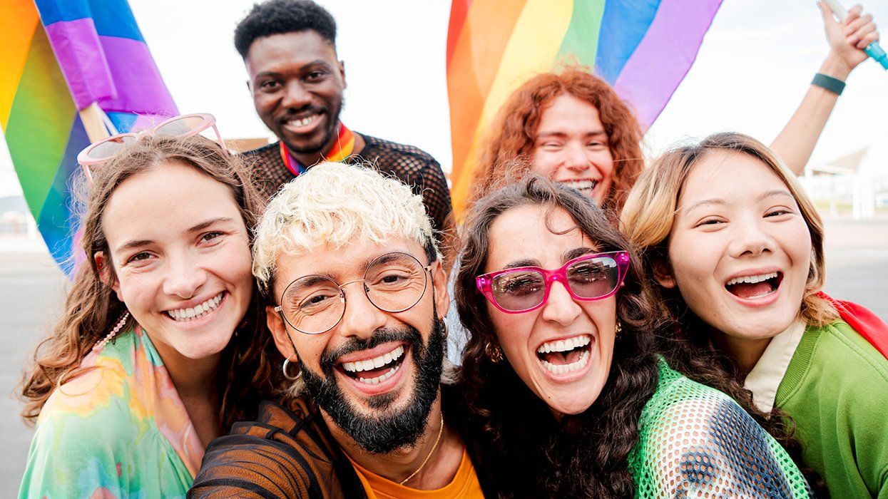 cheerful lgbtqia friends celebrating trans joy