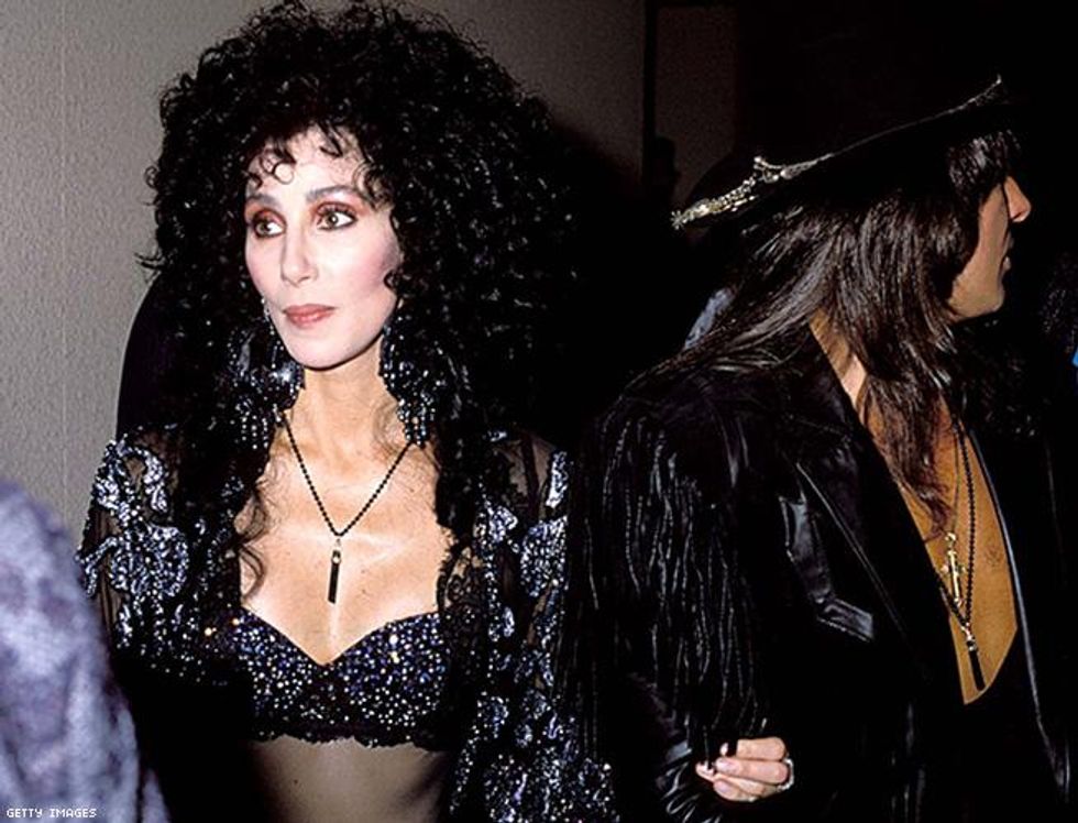 Cher sings "If I Could Turn Back Time." (1989)
