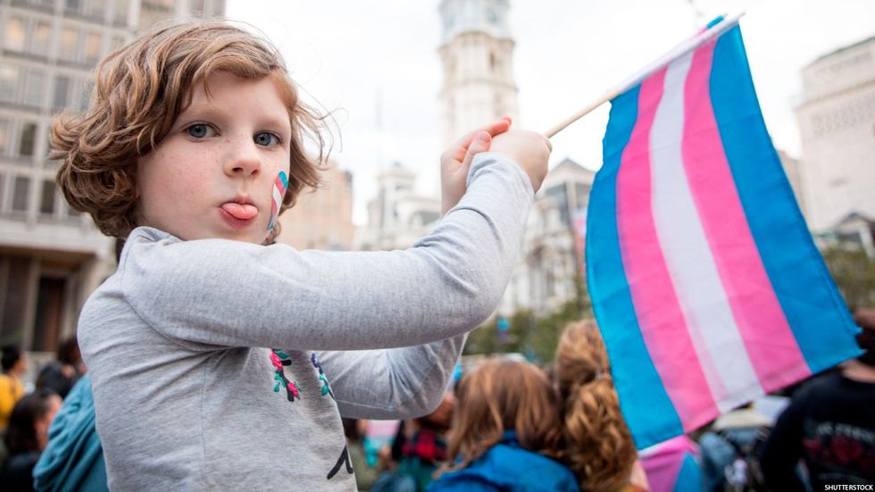Child with trans flag