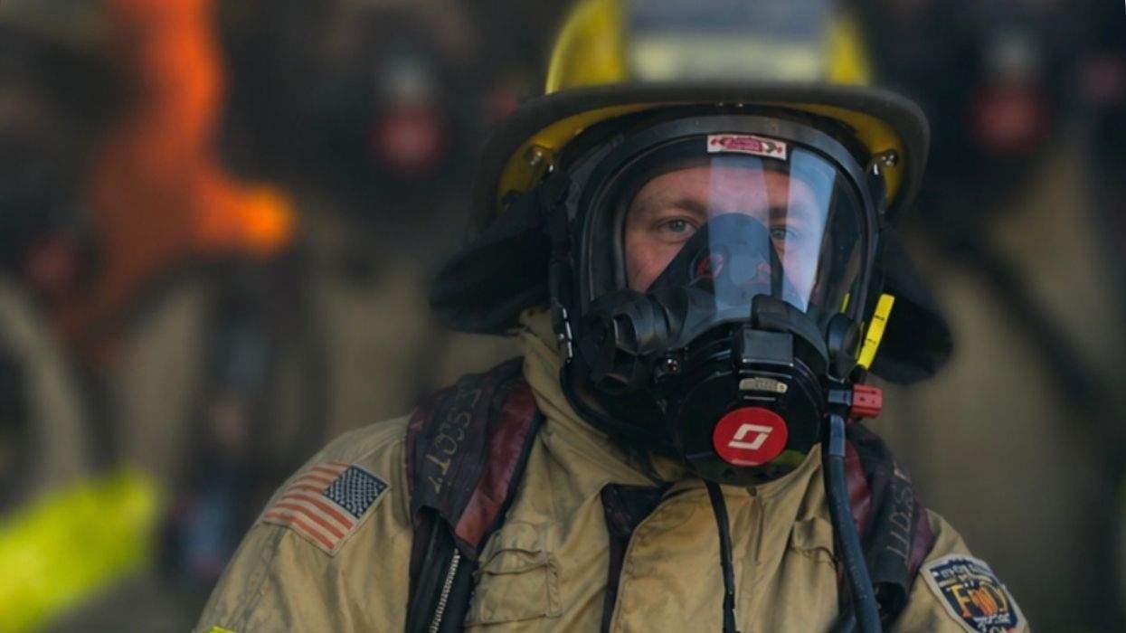 clayton mccallister wearing full firefighter turn-out gear
