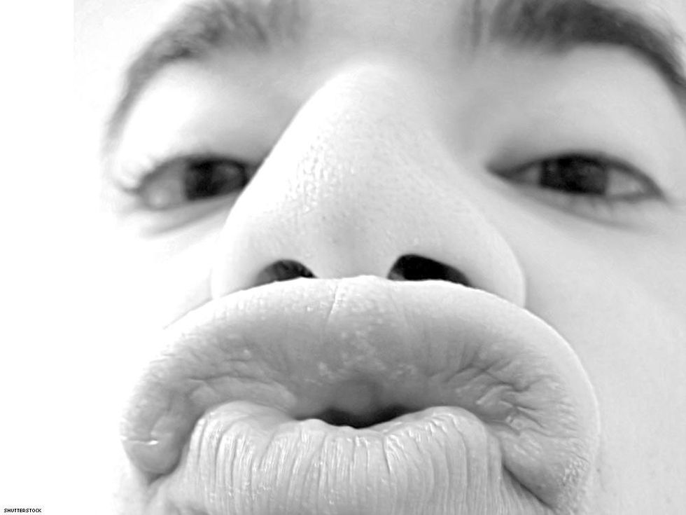 close up of lips making kiss