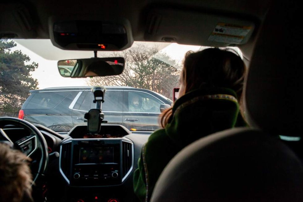 Community observers blocked by federal agent car