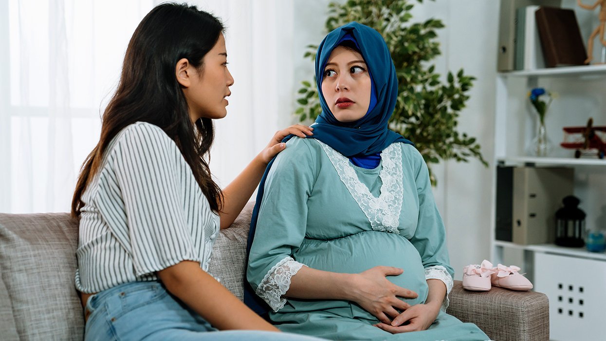 concerned pregnant woman supportive friend