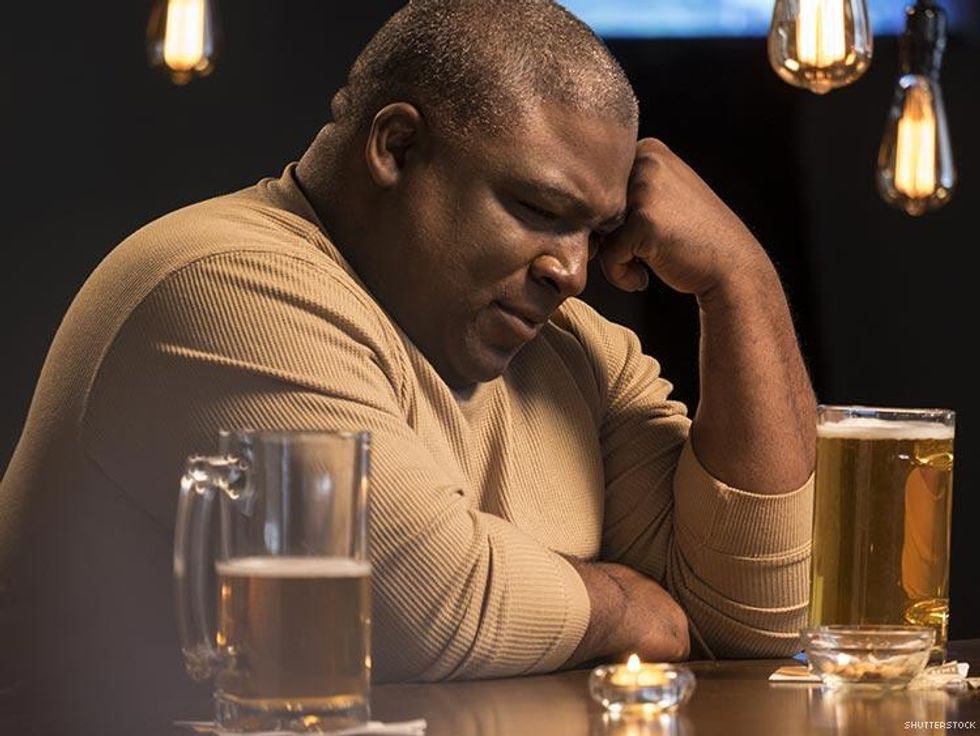 contemplative man at the bar
