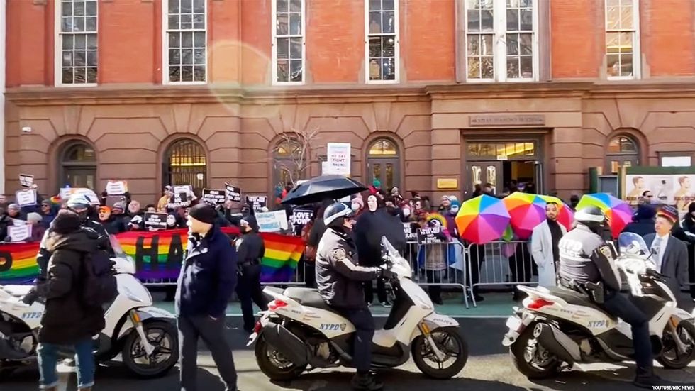 Cops and supporters outside NYC Drag Story Hour
