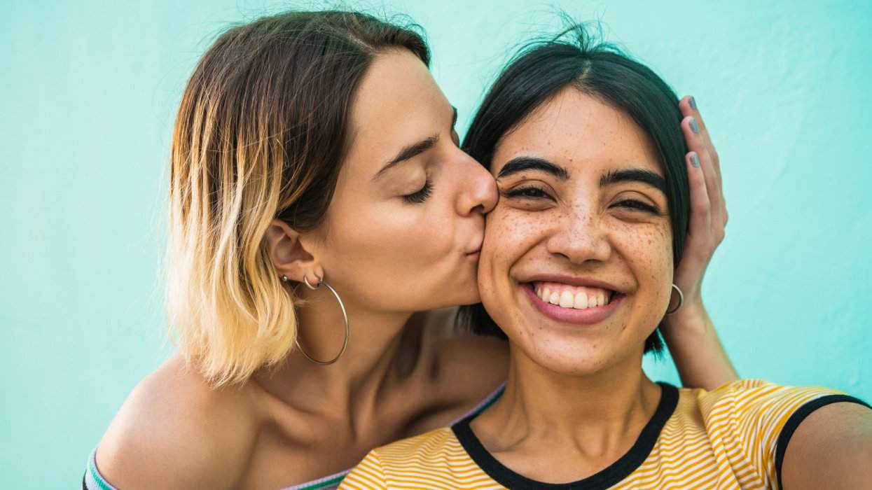 Cute lesbian couple smiling