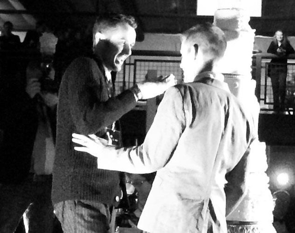 Cuttingcakeatmassrecption_0