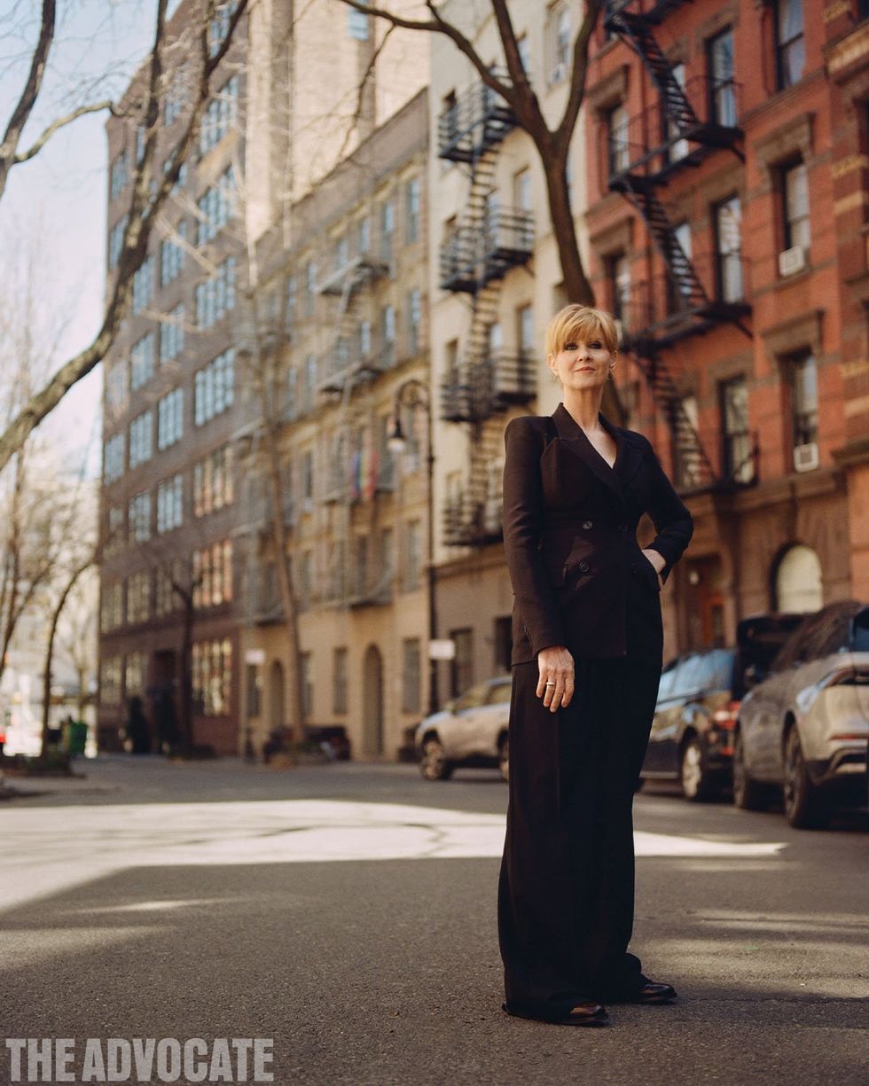 Cynthia Nixon standing in black suit in New York City