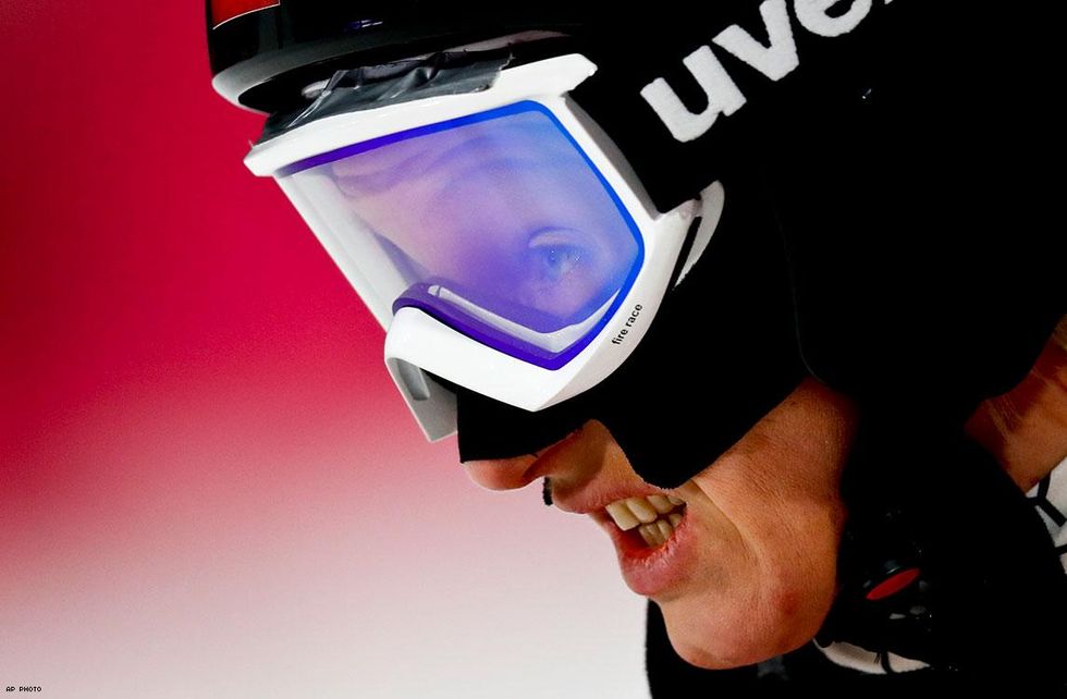 Daniela Iraschko-Stolz, a gay woman of Austria, checks her score during the women's normal hill individual ski jumping competition