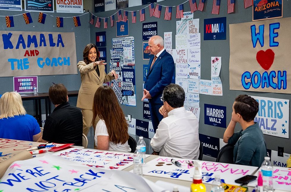 Democratic presidential candidate US Vice President Kamala Harris VP pick Minnesota Governor Tim Walz during campaign office visit Glendale Arizona
