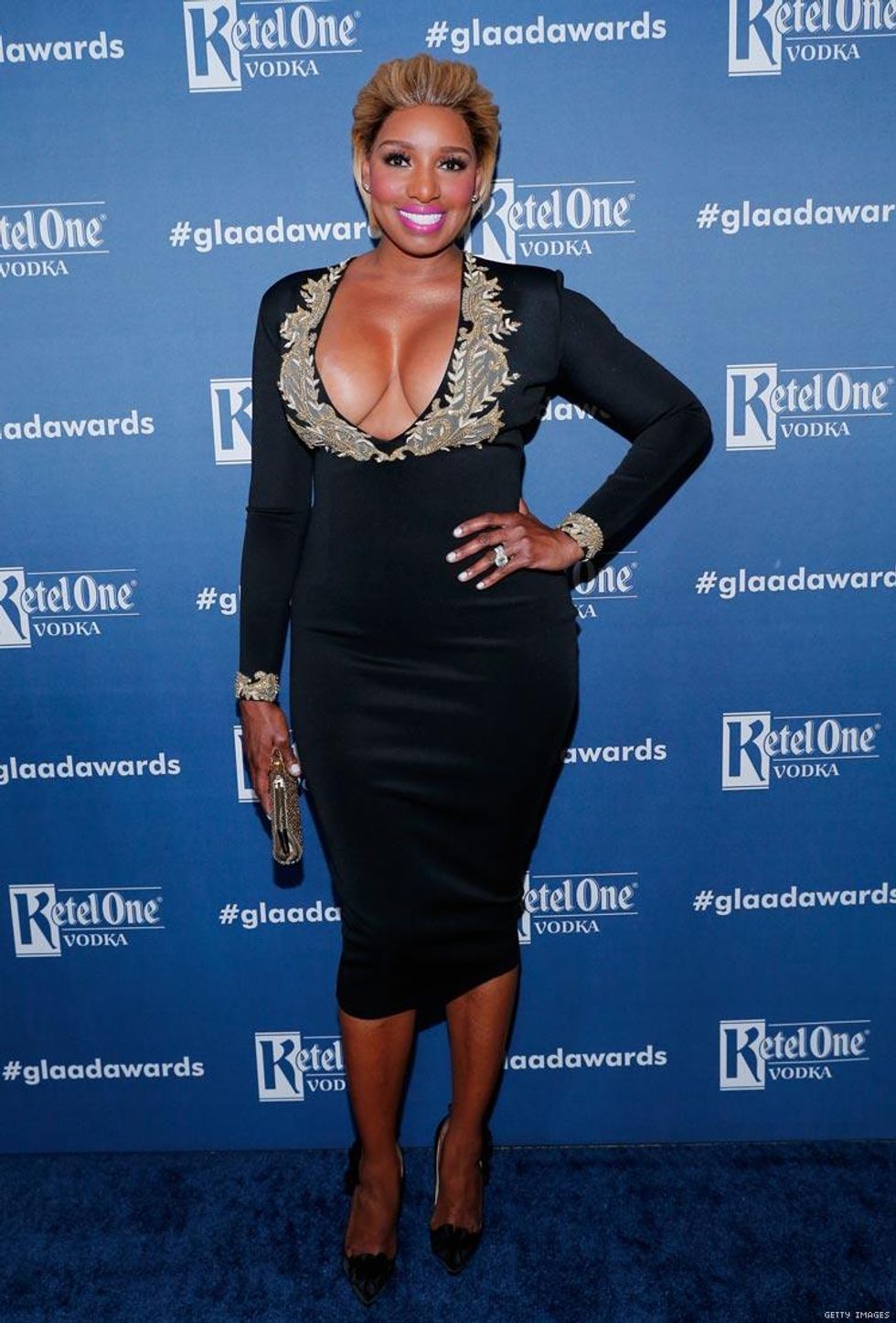 Derek Hough couldn\u2019t get enough of Nene Leakes\u2019 \u201cfashion accessories\u201d as they presented the Award for Outstanding Reality Television Series.