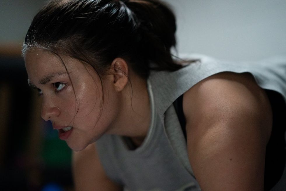 Devery Jacobs as Riley in Backspot