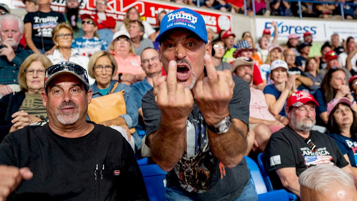 DJT former president donald trump supporters showing profanity giving middle finger angry man in crowd WILKES BARRE PENNSYLVANIA Sept 2022