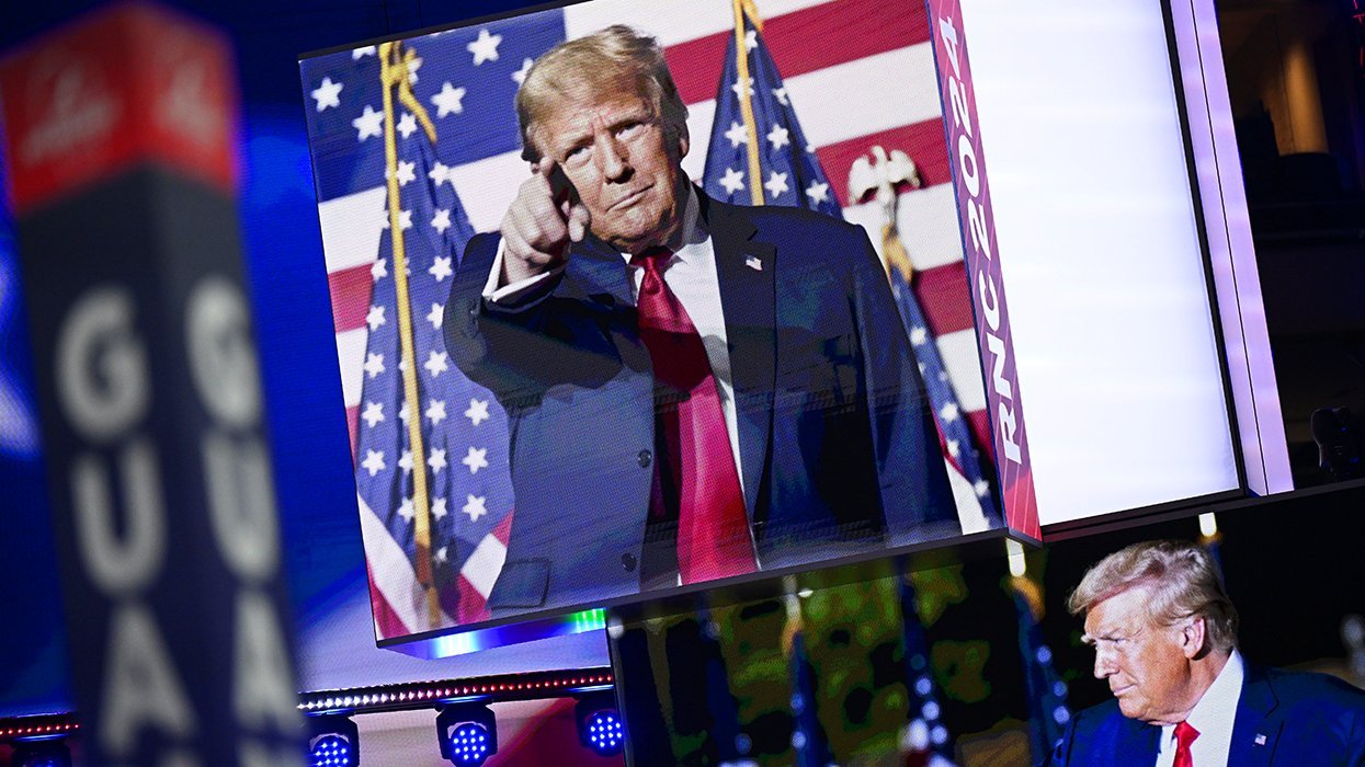 DJT RNC 2024 republican presidential nominee Donald Trump on monitor and stage smirking