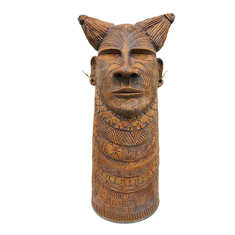 Dodak_head_brown_tall_300