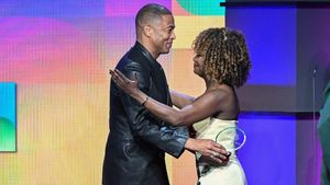 Karine Jean-Pierre presents Don Lemon with lifetime achievement Truth Award as he faces federal charges