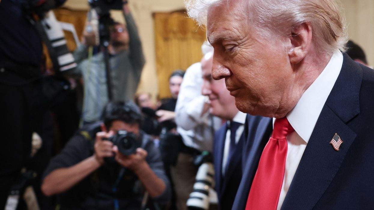 donald trump with cameras taking photos of him