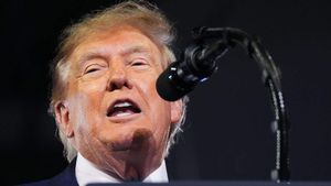 ‘I never did that with a man before’: Trump fawns over Ohio Republican’s body at Kentucky rally