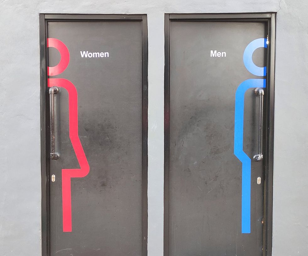 doors marked women men restroom locker room entrance