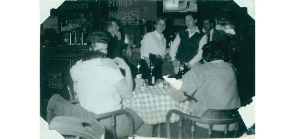Dottie Frank (center) with others at Acme Bar