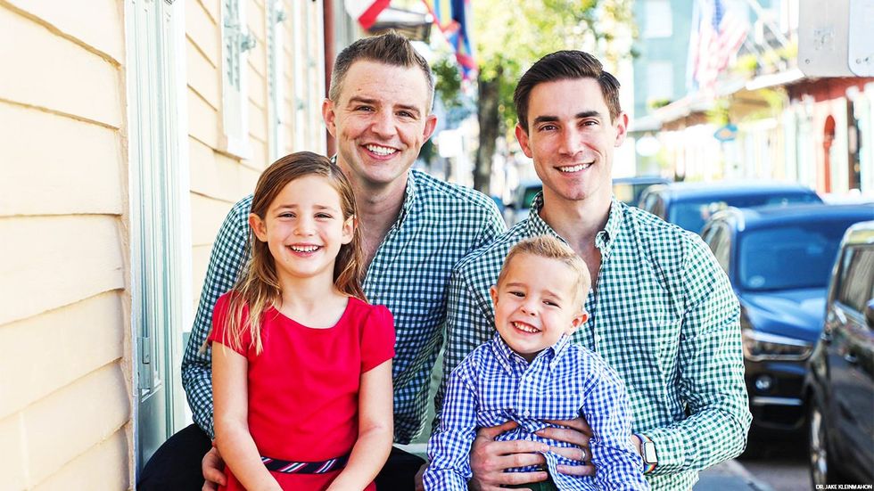 Dr. Jake Kleinmahon (right) with his husband, Tom, and two children