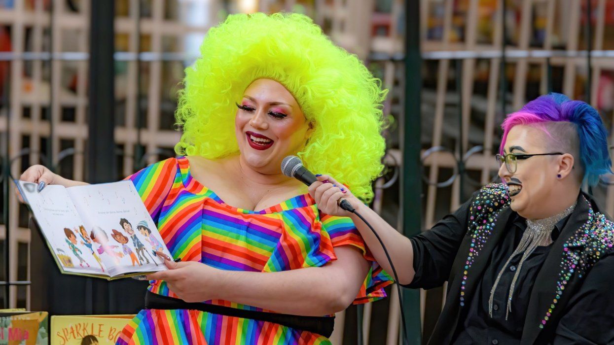 Drag artists reading a kids' book