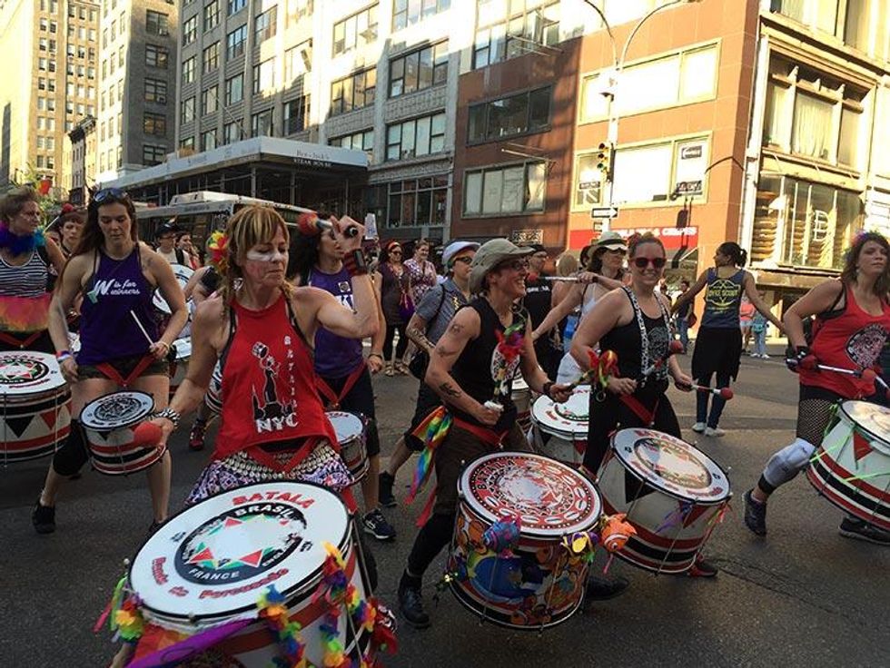 Drummers from the all-female troupe Batala NYC marched while providing percussion.