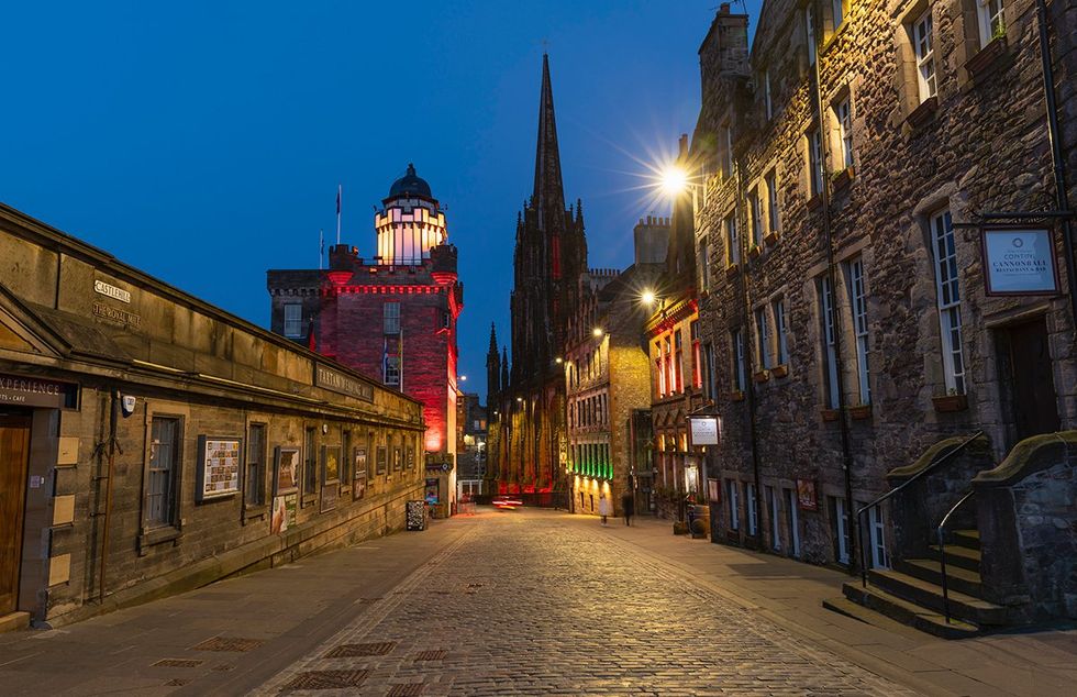 Edinburgh\u2019s most-visited street, the Royal Mile, glowing at dusk