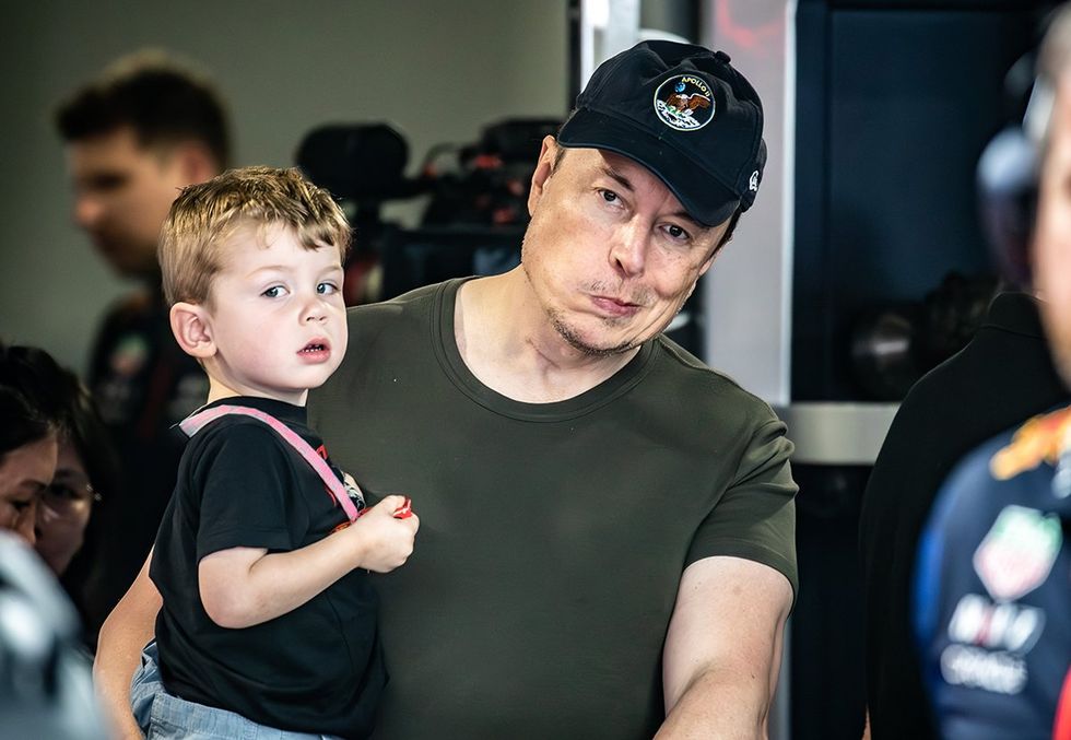 Elon Musk with child