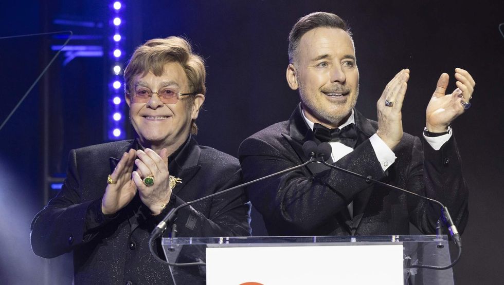 Elton John dishes on his legacy & encourages queer people to fight political 'hostility'