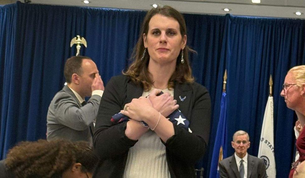 erin krizek receives american flag