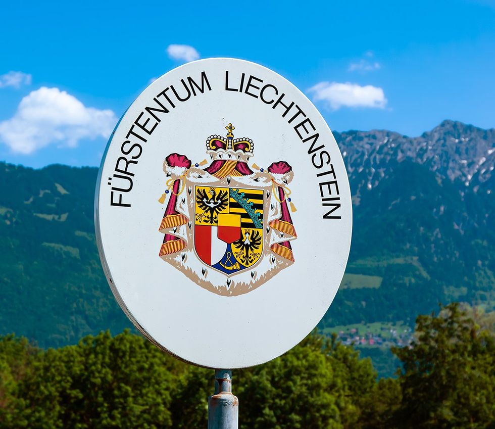 Eschen Liechtenstein 2022 Border sign on the bridge over the river Rhein with the inscription Principality of Liechtenstein and the coat of arms