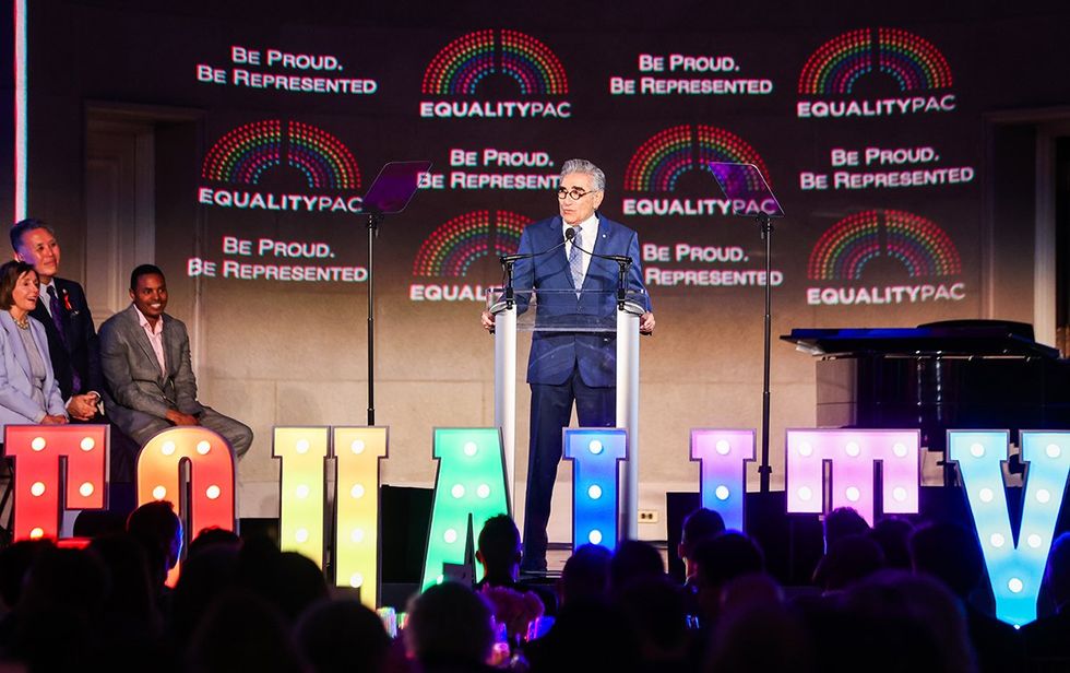Eugene Levy speaking on stage at Equality PAC Gala June 2025