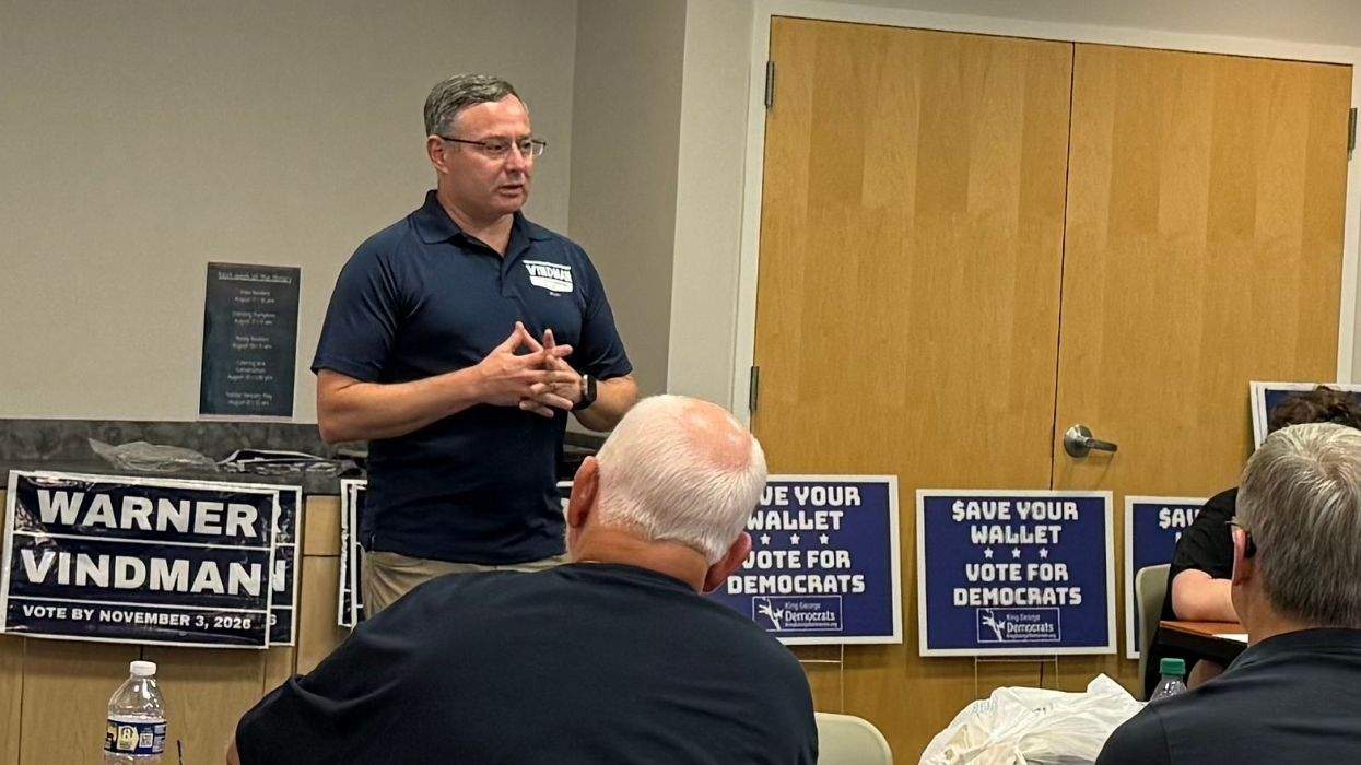 Eugene Vindman speaking in a room with supporters