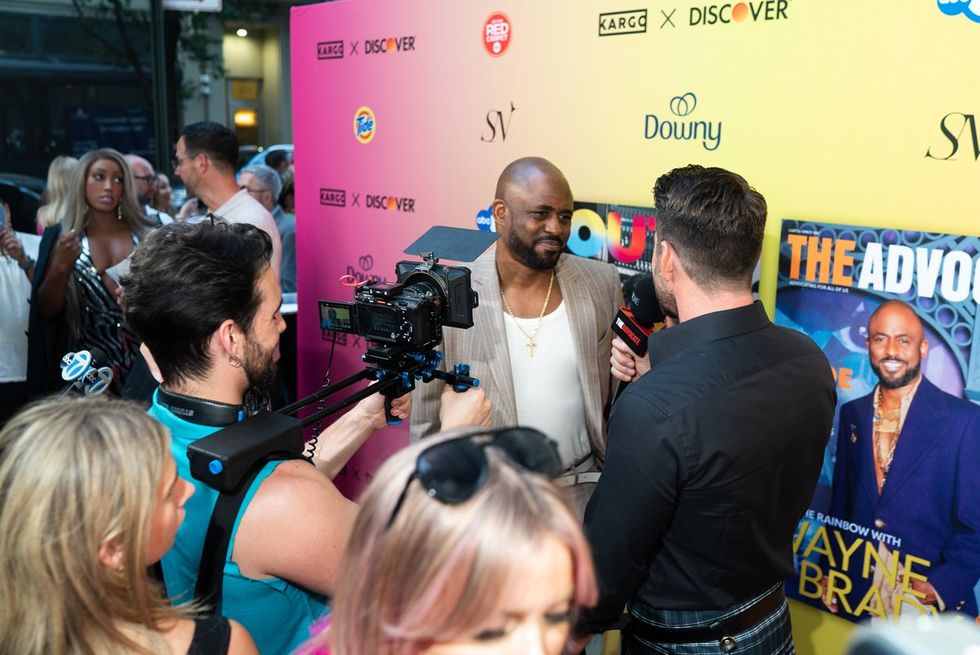 Exclusive Photo gallery OUT ADVOCATE magazines Cover stars Wayne Brady Jonathan Groff LGBTQ Pride Party June 2024