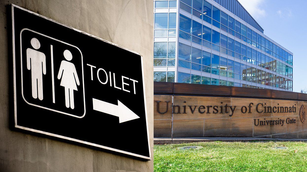female male toilet sign with arrow alongside entrance to University of Cincinnati campus