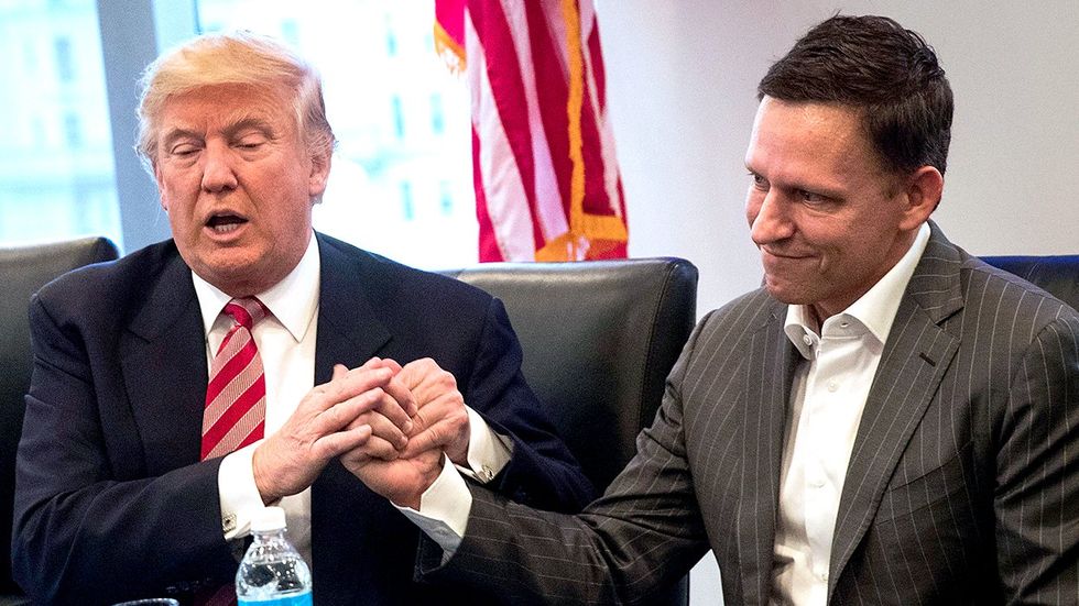 Former US President Donald Trump Peter Thiel hold hands meeting Trump Tower