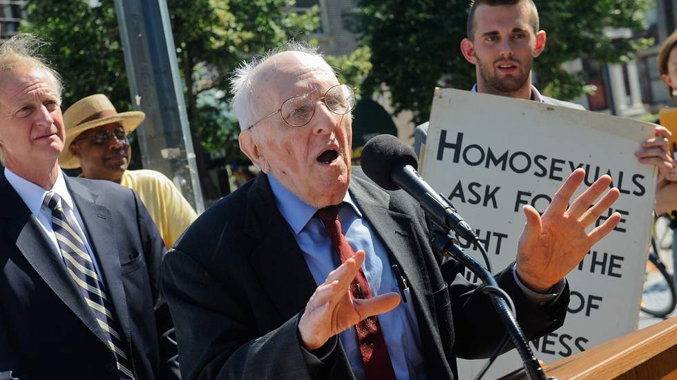 Frank Kameny speaking at a podium during street dedication ceremony June 2010