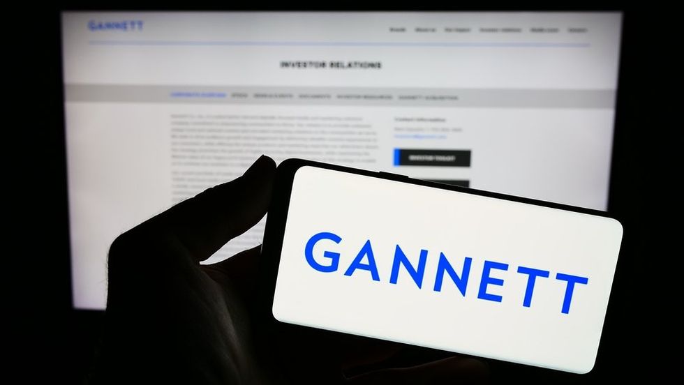 Gannett logo on phone and computer