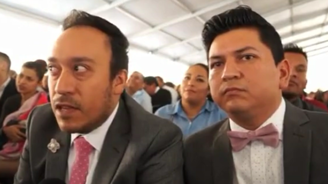 Gay couple getting married in mexico city zocalo square