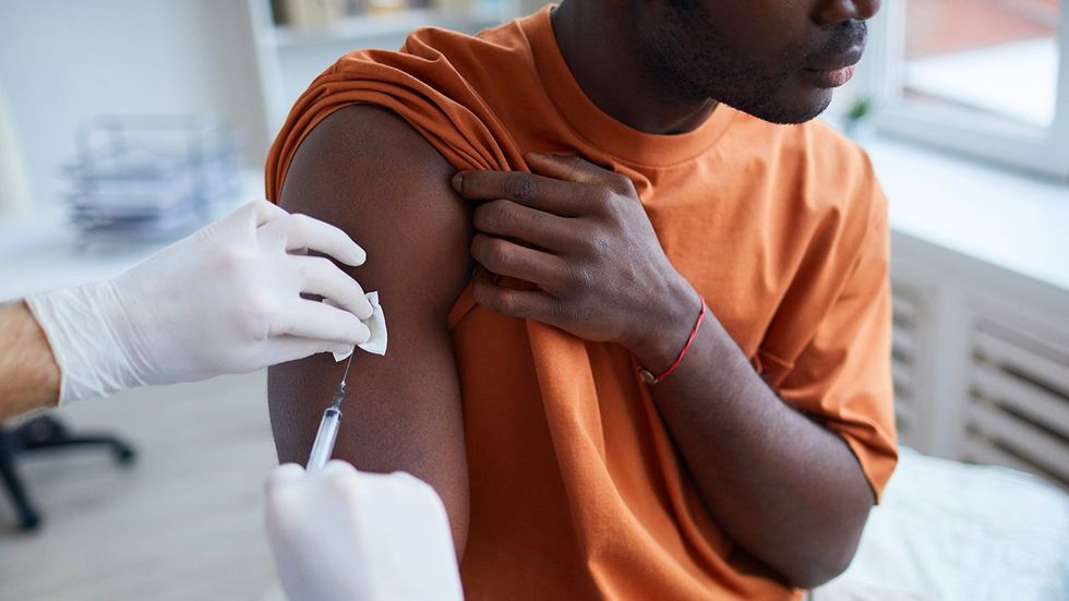 gay man receiving mpox vaccine