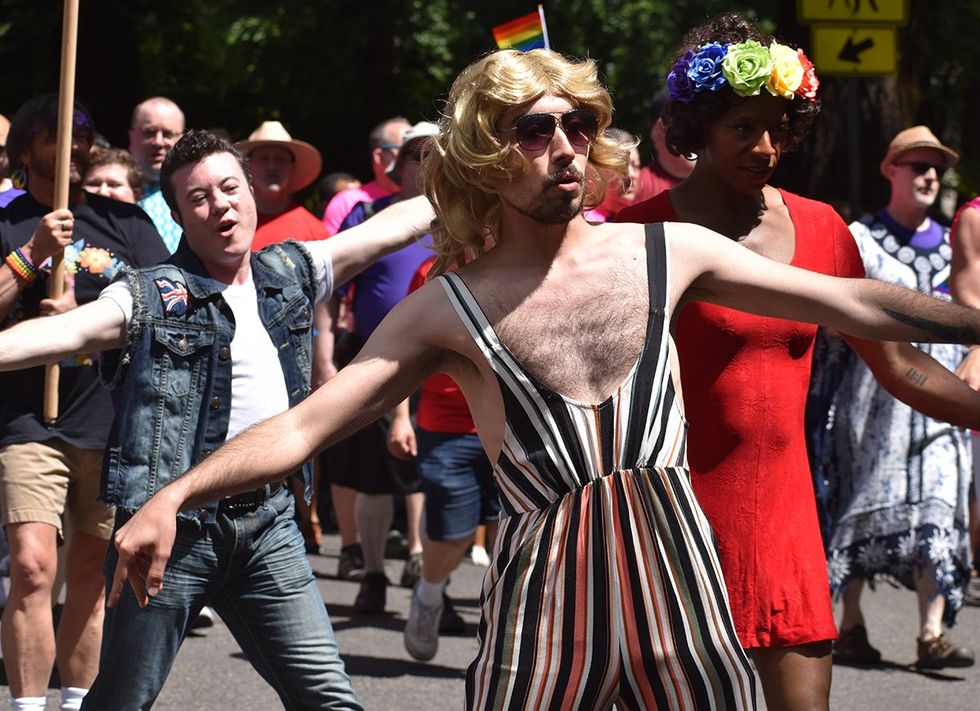 gay men dancing in street during LGBTQ Pride Parade Portland Or 2019