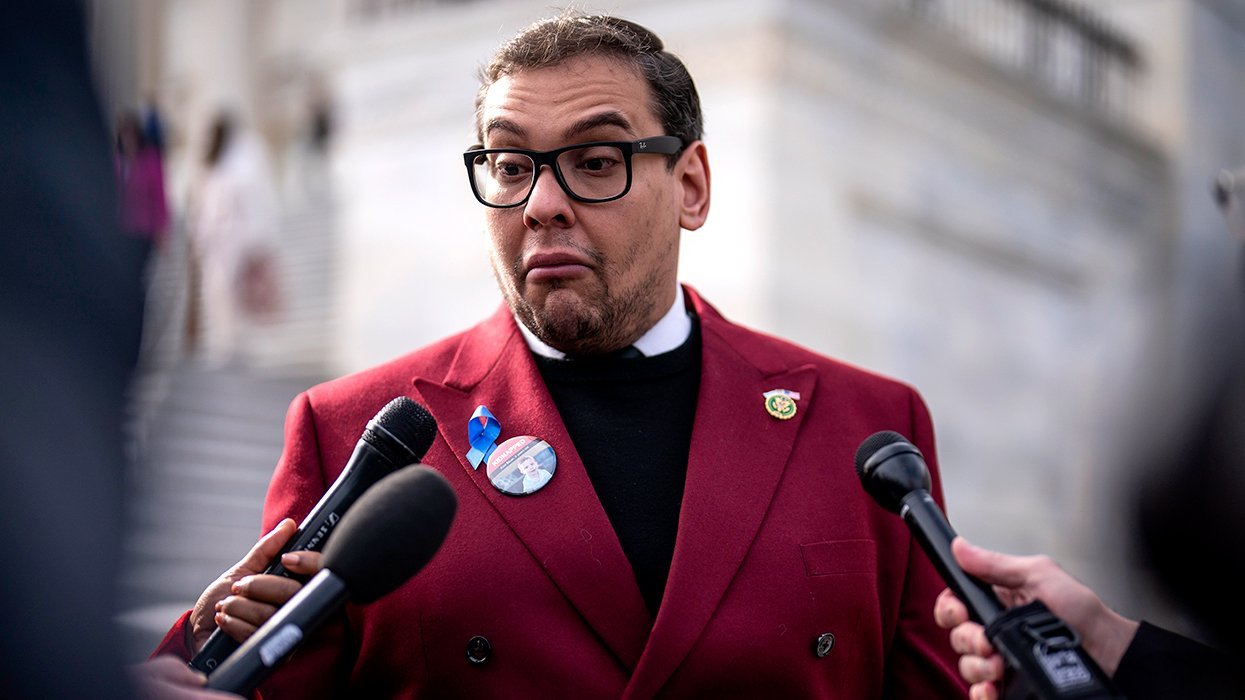 George Santos speaks with reporters after a vote on Capitol Hill