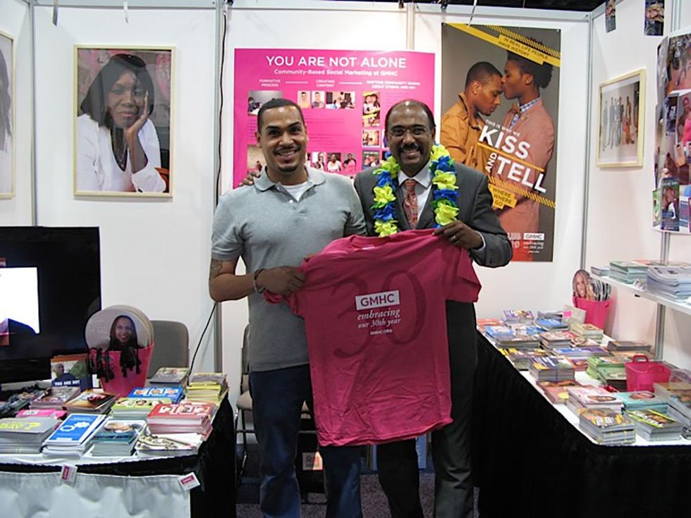 GMHC\u2019s booth at the International AIDS Conference. GMHC staffer Luna Ortiz with Michel Sidib\u00e9, executive director of UNAIDS.