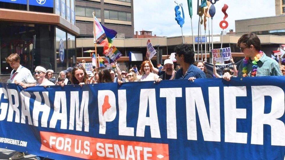 Graham Planer on Our Senate Banner at Pride Parade