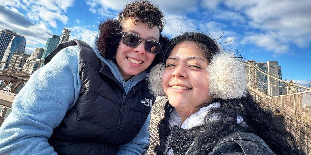 Lesbian federal worker pleads for answers about wife trapped in immigration detention limbo