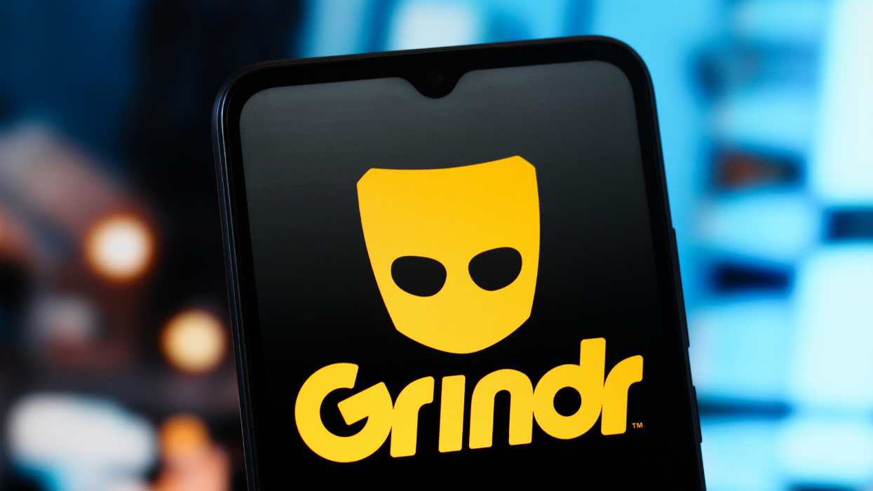 Grindr logo on a phone