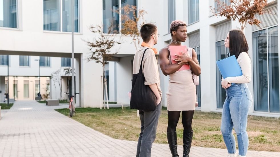 Group of diverse LGBTQ+ students in courtyard