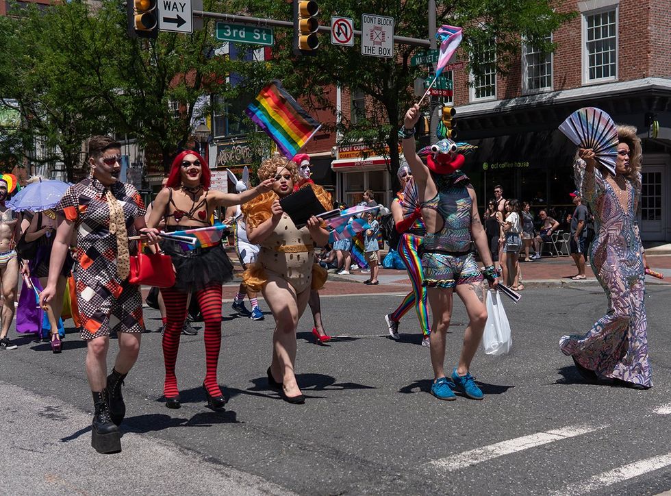group of drag queens dressed up and marching annual gay pride parade LGBTQIA community Philadelphia PA