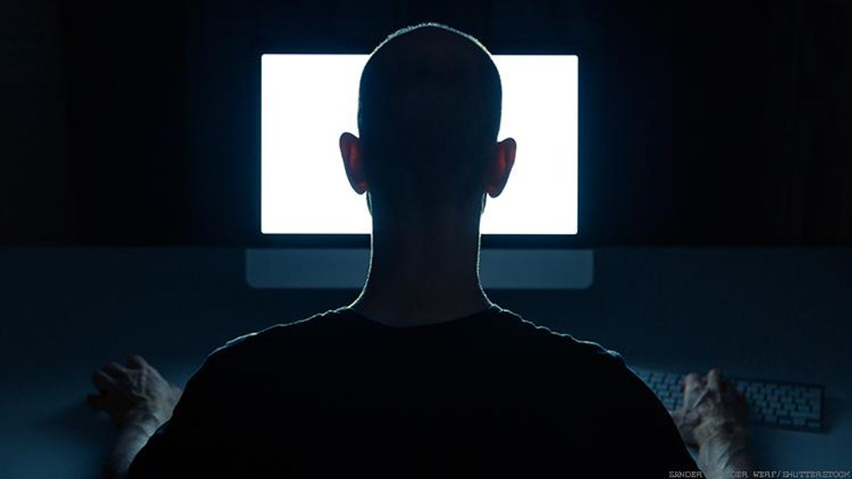 hacker in front of a computer
